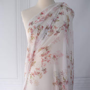 Floral Couture designer soft white silk chiffon fabric with pink flowers and green leaves draped on dressform