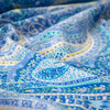 NY Designer Paisley Cotton Jersey fabric is made from 100% cotton for softness and breathability. A designer deadstock fabric that will keep you feeling comfortable and luxuriously stylish all day.  Close up photo.