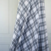 Designer blue and white cotton gauze fabric draped on dressform