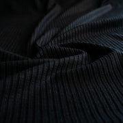 Close-up of NYC Designer Black Rayon Rib Knit fabric by the yard.