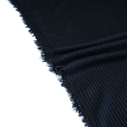 Close-up of selvedge NYC Designer Black Rayon Rib Knit fabric by the yard.
