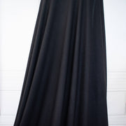 Image of NYC Designer Black Rayon Rib Knit fabric draped on dress form.