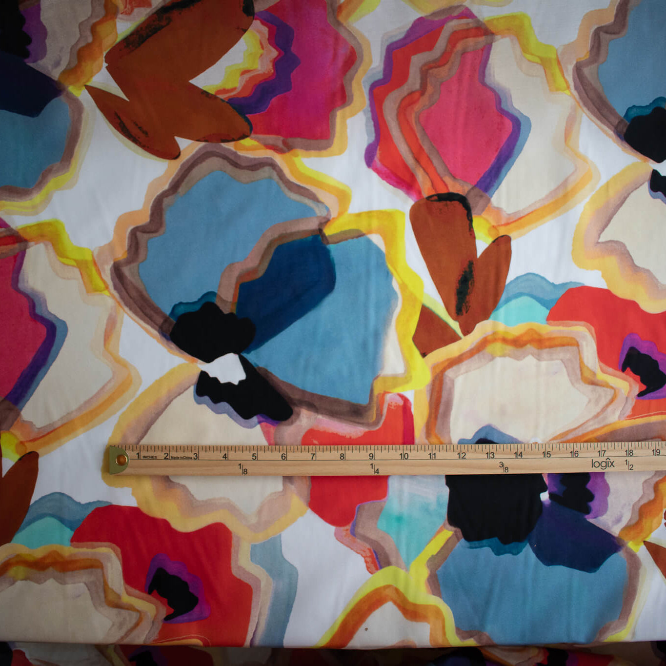 Image of High End Designer Modern Abstract Italian Cotton Silk Lawn fabric with ruler to demonstrate pattern scale.