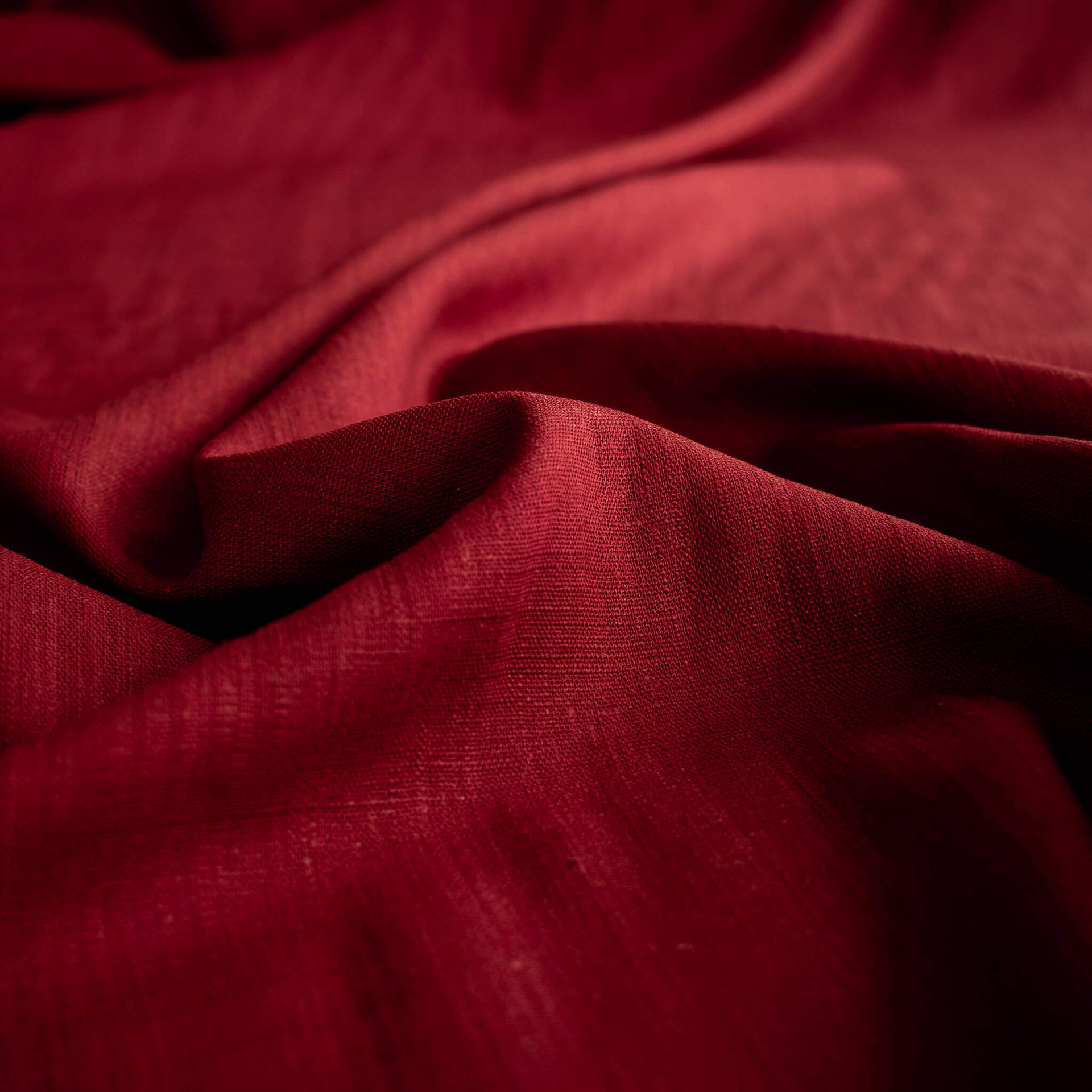 Image of Premium Italian linen-viscose blend in a rich burnt carmine hue.