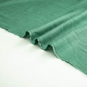 Image of Fine Italian light turquoise linen-viscose blend fabric selvedge.