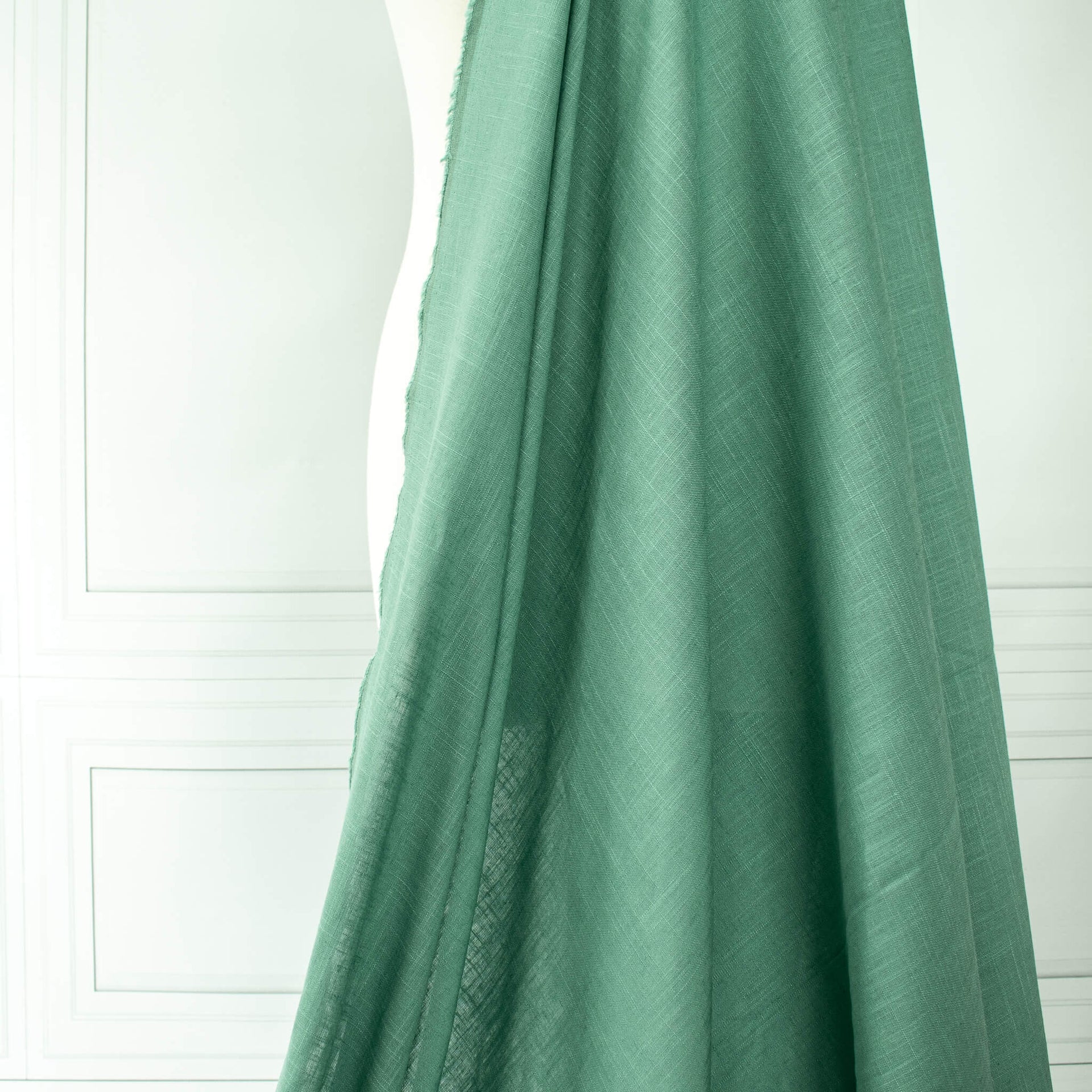 Image of Fine Italian light turquoise linen-viscose blend fabric drape.