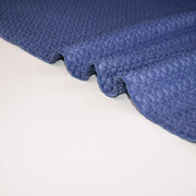 Violet  textured couture designer  fabric on a white background