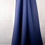 Violet  textured couture designer fabric draped on dressform