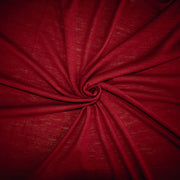 Close-up of  Italian Red Wool Jersey fabric  in a twist