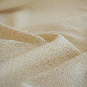 Close-up of Couture Designer Italian Wool Boucle fabric 