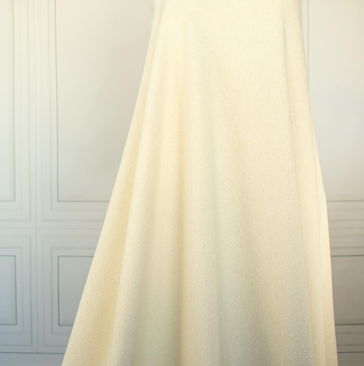 Couture Designer Italian Wool Boucle fabric draped on dressform
