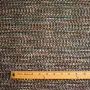 Couture Designer Italian Wool Boucle fabric  with a ruler at the bottom for scale