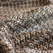 Close-up of Couture Designer Italian Wool Boucle fabric by the yard.