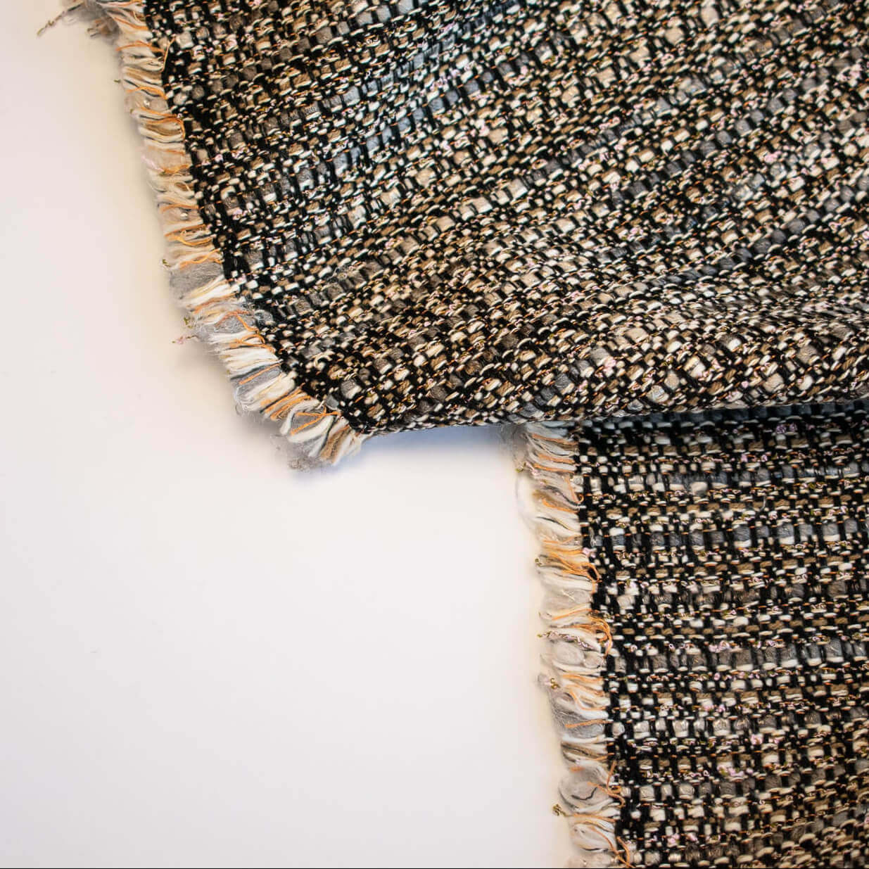 Couture Designer Italian Wool Boucle fabric by the yard  on a white background