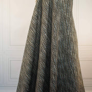 Couture Designer Italian Wool Boucle fabric draped on dressform.