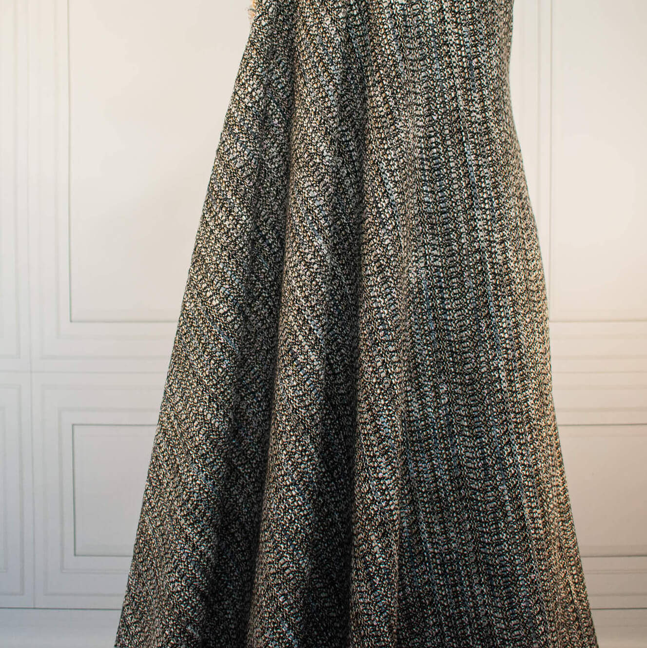 Couture Designer Italian Wool Boucle fabric draped on dressform.