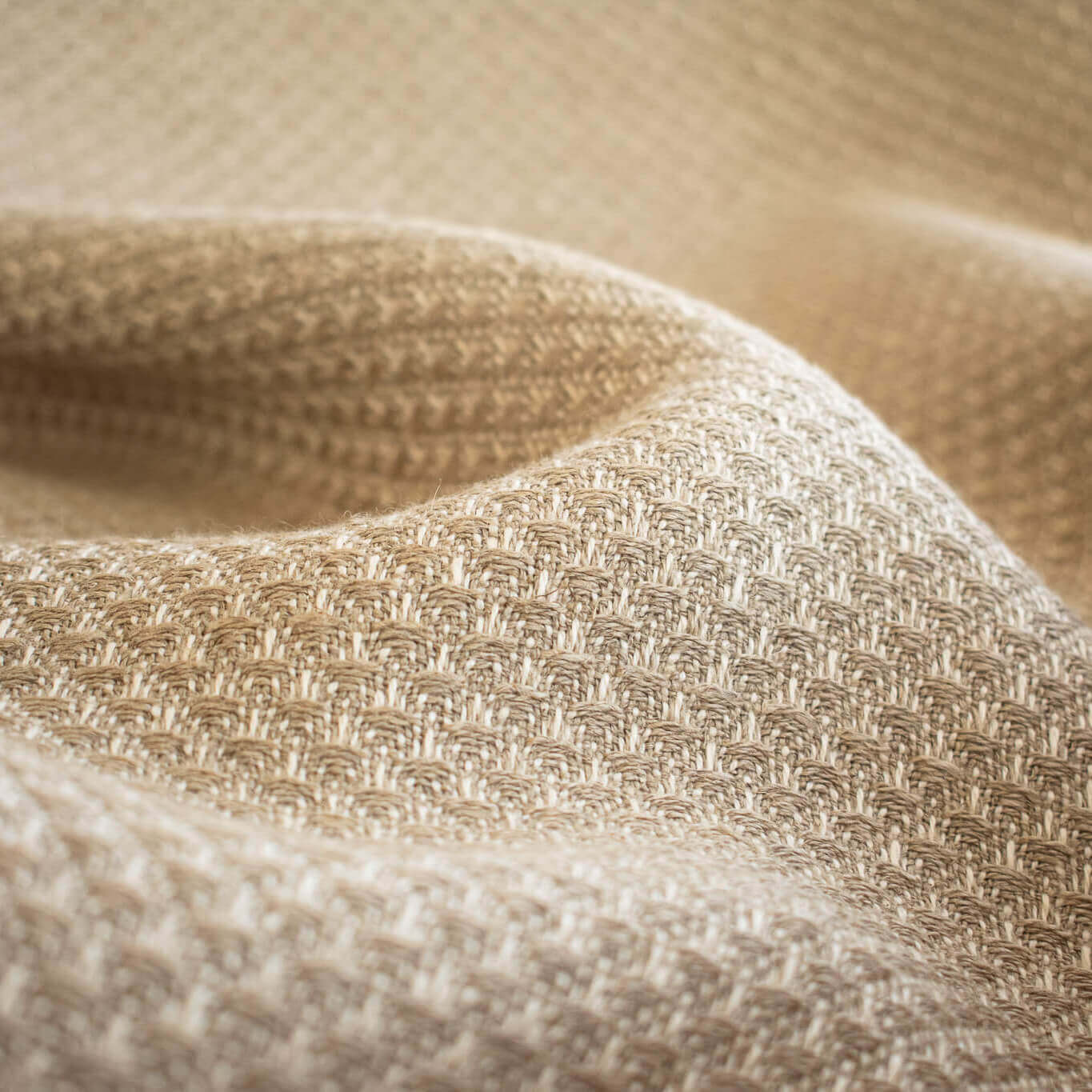 Close-up of Couture Designer Golden Champagne Italian Wool Woven fabric 