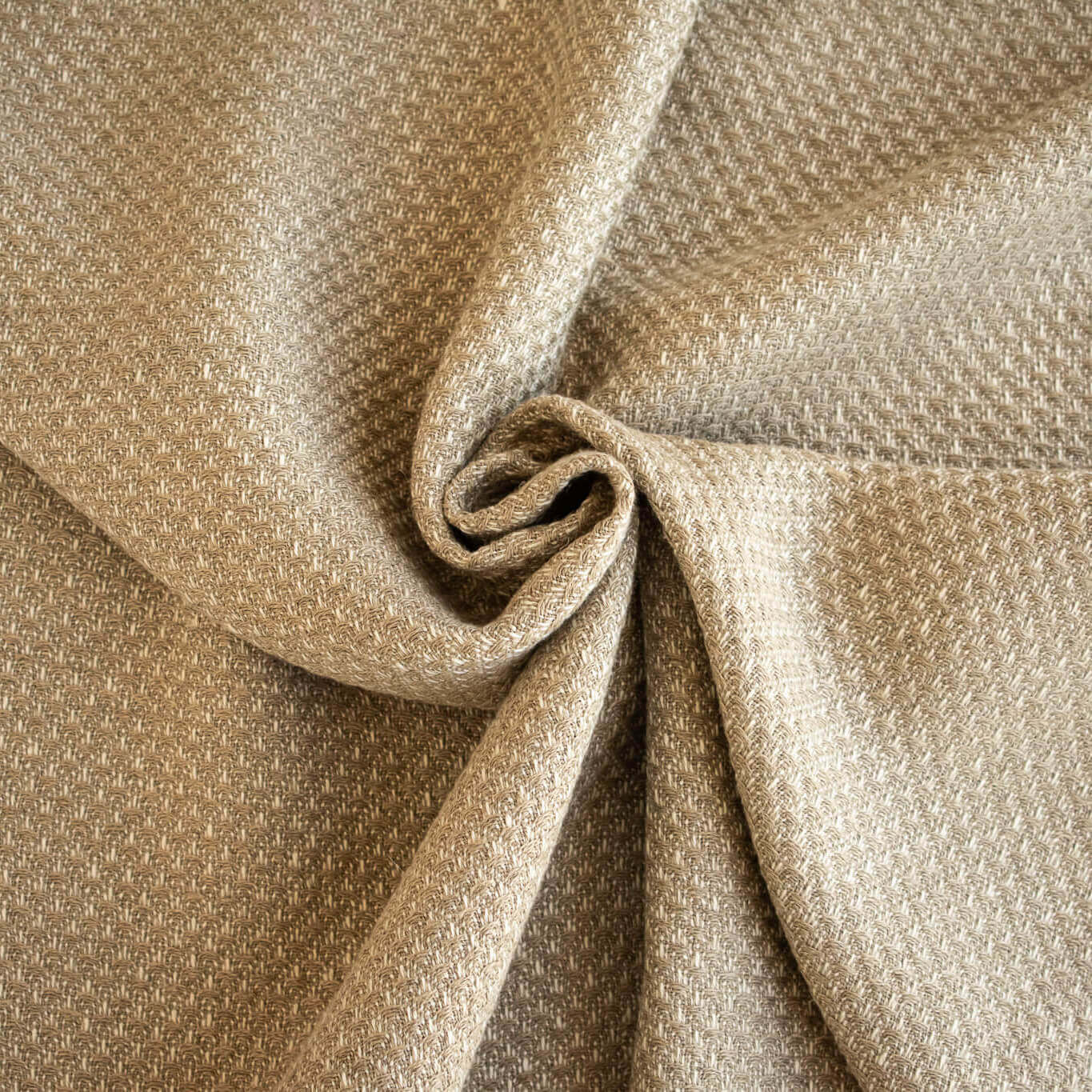 Close-up of Couture Designer Golden Champagne Italian Wool Woven fabric  with a twist..