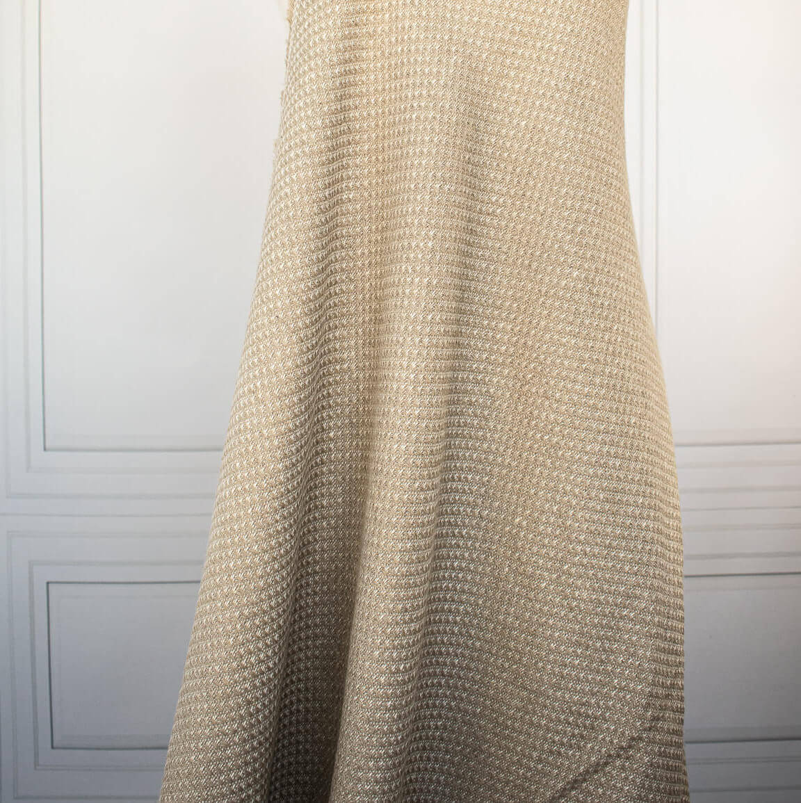 Couture Designer Golden Champagne Italian Wool Woven fabric draped on dressform.