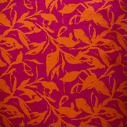 Image of Italian Viscose fabric by the yard in a tropical leaf print demonstrating print scale.