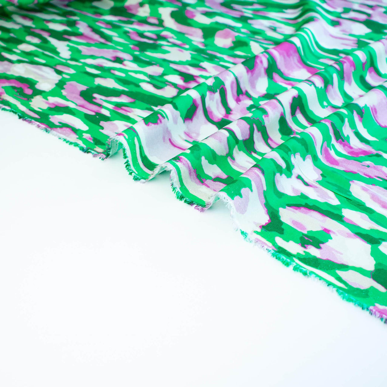 Image of Italian Viscose Woven Abstract Print fabric selvedge.