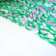 Image of Italian Viscose Woven Abstract Print fabric selvedge.