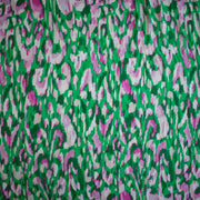 A close-up of Italian Viscose Woven Abstract Print fabric showing print.