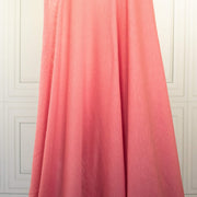 Image of Fine Italian Wool Jersey knit fabric in Pink Blush draped on dress form to show fabric drape.