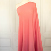 Image of Fine Italian Wool Jersey knit fabric in Pink Blush draped on dress form.