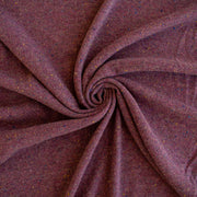 Image of Fine Italian Wool/Silk Blend Knit fabric by the yard in a heathered Violet Iris color-way swirled to show fabric fullness.