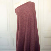 Image of Fine Italian Wool/Silk Blend Knit fabric draped on dress form.
