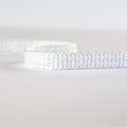 Mokubba Ivory Passenmenterie in soft white close up. Perfect trim to add a couture touch.