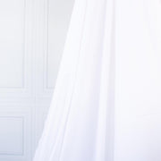 High-End Designer White Cotton Fine Twill fabric by the yard. Simple elegance at its finest from a Los Angeles designer that has a knack for finding luxurious fabrics. Image of fabric drape.