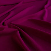 Famous Designer Poly/Spandex ITY Knit in 'Berry Rich'! This designer deadstock fabric by the yard boasts a rich berry color that is sure will elevate any project. Its smooth hand and elegant drape is a must have for comfort and style. Close up image of fabric.