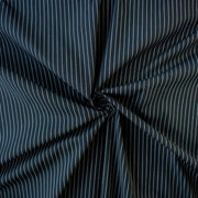 NYC Designer Dark Navy/White Striped Cotton/Spandex Shirting fabric by the yard in a midnight blue is a perfect staple when building your wardrobe pieces. This designer deadstock fabric boasts a soft and smooth hand, is tightly woven and enhanced with a touch of stretch.  Image of fabric fullness.
