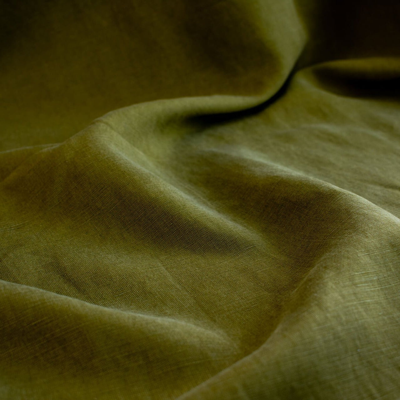 NYC Designer deadstock fabric by the yard. This linen and cotton blend shirting has such a lovely soft hand you'll absolutely love it. The fabric has a  supple drape, and leans towards a mid-weight. Close up image