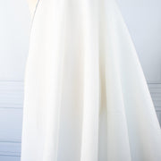 NYC Designer Linen blend designer deadstock fabric by the yard is the perfect fabric if you just love linen. &nbsp;A plain weave off-white fabric with a soft, slightly crisp hand. Image of fabric drape.