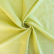Made of 100% linen, this shirt-weight fabric features a gentle blend of spring green, white, and soft yellow tones, perfect for a stylish shirt, dress or skirt. Enjoy the lightweight, soft semi-crisp hand of this cross-dyed, woven fabric. image of fabric fullness.