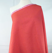 Image on dress form of luxurious 100% linen fabric by the yard .