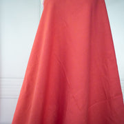 Image on dress form of draped 100% linen fabric by the yard .