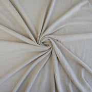 Close up of fabric fullness in a swirl of  Designer White and Gold Metallic Sweater knit fabric by the yard. 