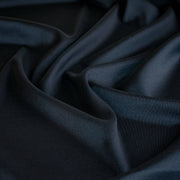 Dark blue silk twill fabric with folds
