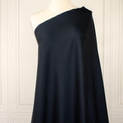 Close up of Dark Navy NYC Designer silk twill fabric.
