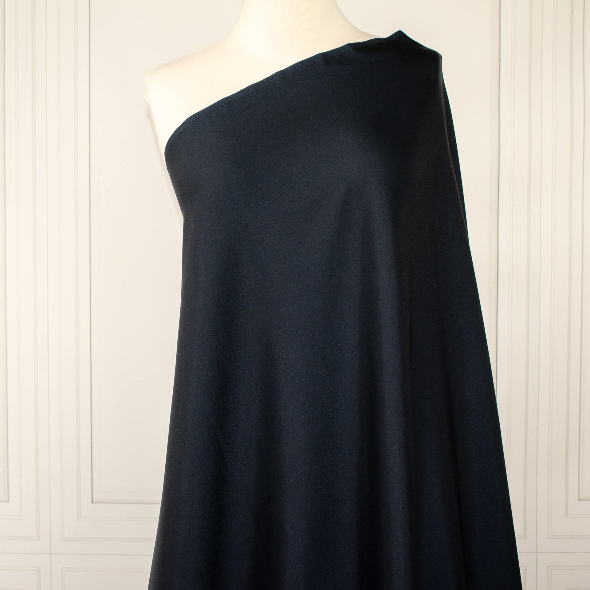 Close up of Dark Navy NYC Designer silk twill fabric.
