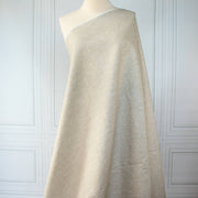  Image of tan/white 100% linen mid-weight woven fabric on dressform 