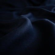 Close-up of dark blue Linen fabric 