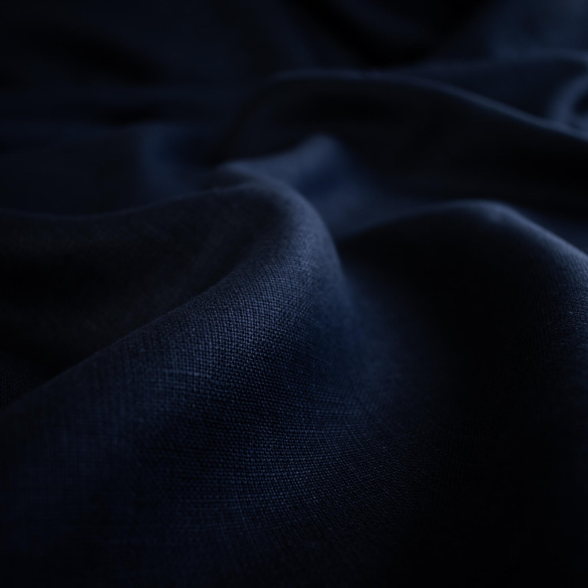 Close-up of dark blue Linen fabric 
