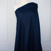 Dark Blue linen fabric draped on dressform.