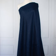 Dark Blue linen fabric draped on dressform.
