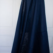 Dark Blue linen fabric draped on dressform.